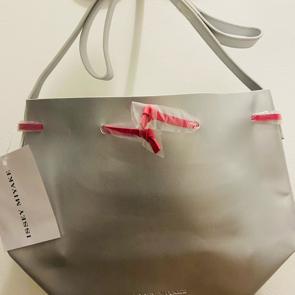 New: Beautiful ISSEY MIYAKE Bucket Bag with long shoulder strap.